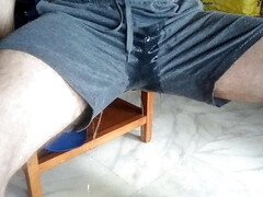 John is pissing all into his short at the table