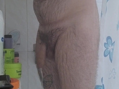 hairy man drains and spunks in the bathroom