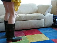 in rubberboots and desperate to piss