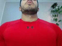 Shredded Bodybuilder Flexing in Red Spandex Klaus Kasper