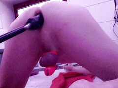 Anal training with 10 inch big black dildo on the fucking machine whilst in chastity