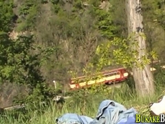 Watch this amateur twink take it raw outdoors and get a facial cumshot