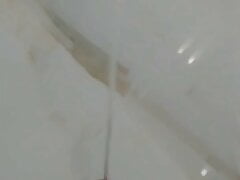 Strong piss in hotel bath