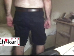 Coach Karl shows off his blue shorts