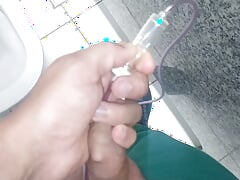 Making an application with serum directly into the boy's vein.