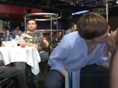 Guy opens his mouth for male stripper cum