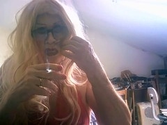 Sissy in high heels smoking and having a blast in lingerie