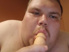 Giant guy fellating a fuck stick