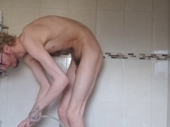 Impressive piss stream as skinny teen unleashes a golden shower from his ass after an enema