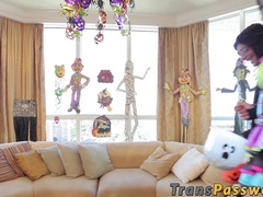 Pretty tgirl lets pair of penises penetrate both her holes