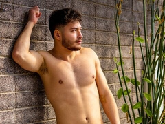 Solo pretty boy Theo Banks strokes his large cock