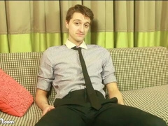 Suave business guy Scott Anders jerks off on a couch