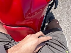 Big dick 23cm soft in shorts without underwear taking a motorcycle ride on the street
