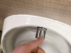 Cruising in public toilets wanking my hard cock