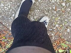 Crossdresser walking in the woods