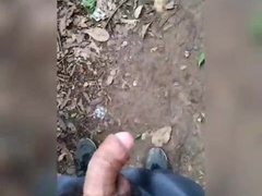 Ambling around the park with his bone out of his cutoffs.