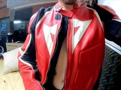 Fit guy in leather suit does a sexy striptease and masturbation with his giant cock