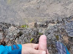 Cliffwanker - Felixproducer wanks on a rock and shoots his sticky load of sperm down that cliff