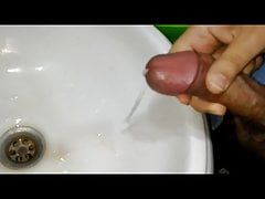 jacking off and cumming in the sink