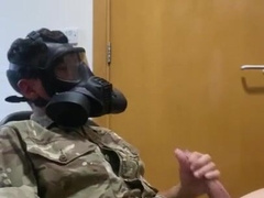 Army twunk milking off in his gas mask