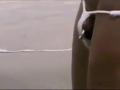 Bulky Chinese Dude Bares Nearly All at the Beach