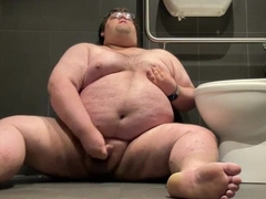 Obese plays in public douche