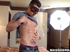 Athletic tattooed jock Frank masturbates and shows firm ass