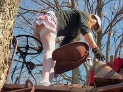 Crossdresser showcases lingerie in a seductive farm setting