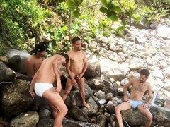 Lovemaking-crazed surfers have fuck-fest with their mates on a naturist beach.