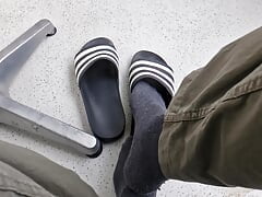 Addilettes with socks on the balcony 1