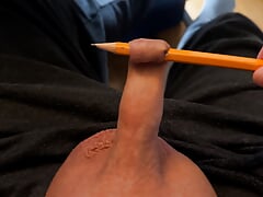 Play with the foreskin of my little cock and a pencil