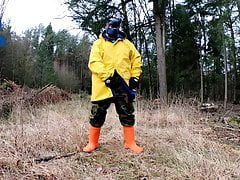 Raingear pup wanking outdoors during sunday walkies
