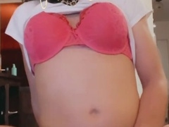 Having naughty fun with sex toys in the living room