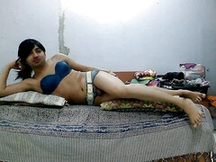 Sweet sissy crossdresser femboy Sweet Lollipop with denim bikini on the bed.