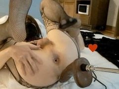 Submissive sissy gets anal penetration from massive black dildo machine