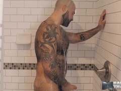 Muscular hairy man Atlas Grant masturbates solo in WOOLYTEDDY style
