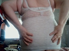 Milky guy in girdles and a bra enjoys some solo action