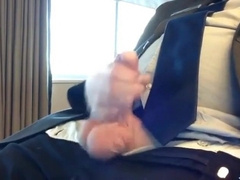 Suited Silver Fox Jerks Off Solo