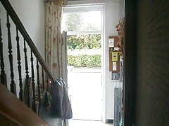 Small stroll in front of the house dressed in baby with its