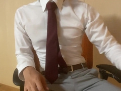 Asian boy drains while dressed in a suit (four)