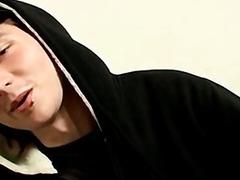 Dashing twink in a hoodie tugs on his big cock