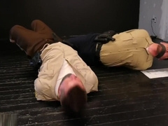 2 beefy cops bound gagged and struggling.