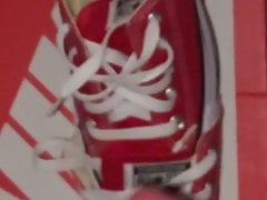 Shooting cum onto her converse again
