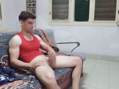 Scrambled1994 strokes his huge cock while his girlfriend is away