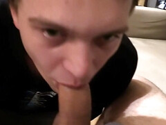 Clothed boy keeps sucking the cock until sperm begins to drop on his lips