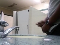 Black perv caught jerking in restroom