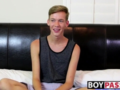 Skinny twink wanks his long cock until he explodes his jizz