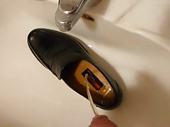Piss in men's dress shoe