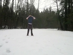 strips and remains naked in the snow