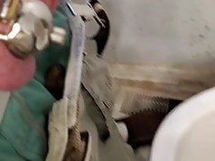 Me taking a pee while in chastity cage.